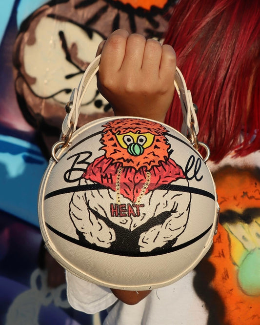 “SebasArtClub Baller purse.”